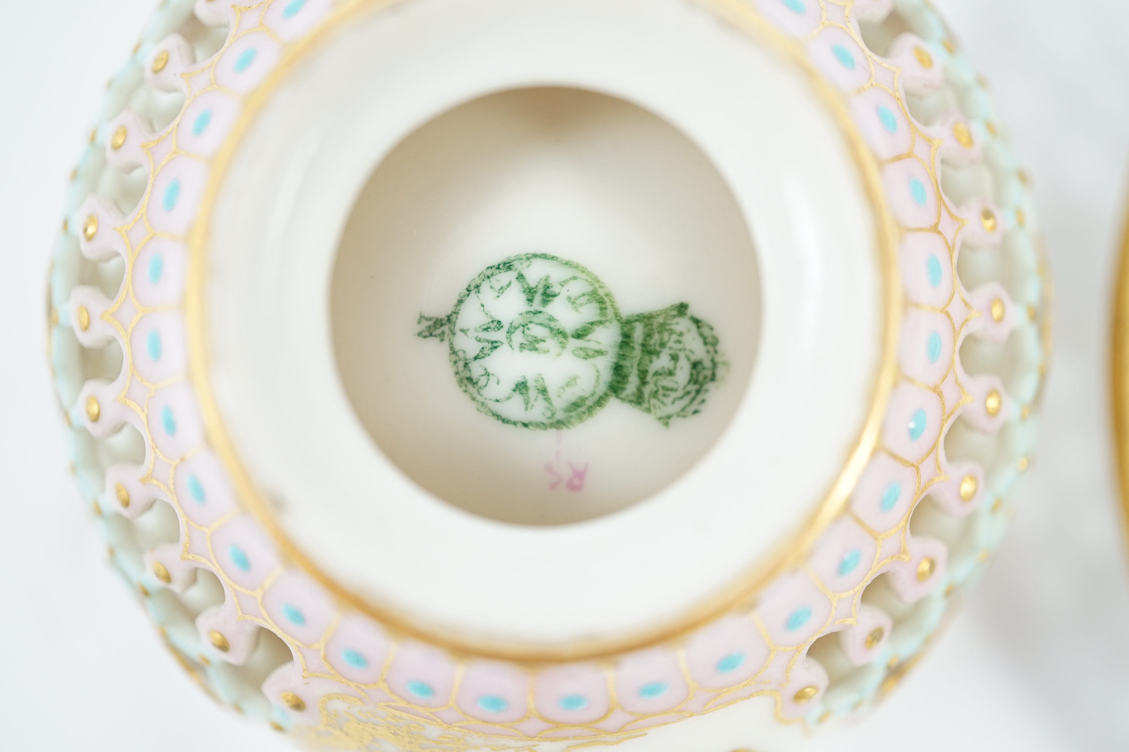 A Royal Worcester reticulated miniature cabinet cup and saucer, late 19th century